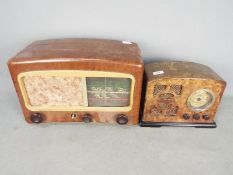 A modern Steepletone radio # B643191 and an original bakelite cased radio by Cossor model 501 AC