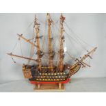 A scratch built model of a Galleon measuring approximately 81 cm x 95 cm x 30 cm.