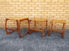 A nest of three tables by Nathan from the Burlington range approximately 50 cm x 53 cm x 48 cm.