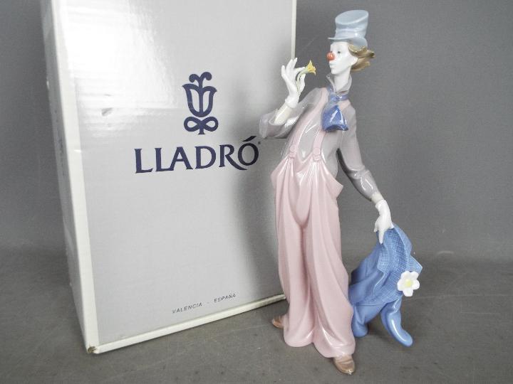 Lladro - a figurine depicting a Clown entitled A Mile of Style # 6507 issued 1988, approx 36 cm (h).