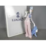 Lladro - a figurine depicting a Clown entitled A Mile of Style # 6507 issued 1988, approx 36 cm (h).