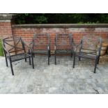 Four metal garden armchairs,
