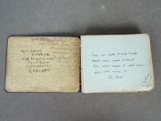 A World War One (WW1) autograph book containing the witticisms and poems of numerous wounded