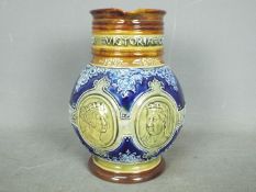 A Doulton Lambeth glazed stoneware jug commemorating the Diamond Jubilee of Queen Victoria with