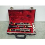 Clarinet in lined fitted box. Case is 36 cm wide.