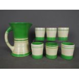 Royal Doulton - an Art Deco 7-piece lemonade set comprising bright green and white striped eggshell