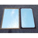 Two wall mirrors, largest approximately 64 cm x 49 cm.