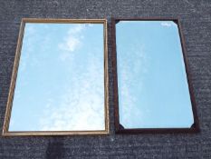 Two wall mirrors, largest approximately 64 cm x 49 cm.