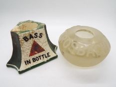 An early 20th century advertising match holder / striker for 'Bass In Bottle' by Mintons and a