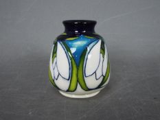 Moorcroft - a ceramic Forde vase,