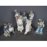 Nao - Seven figurines by Nao of children, largest approximately 21 cm (h).