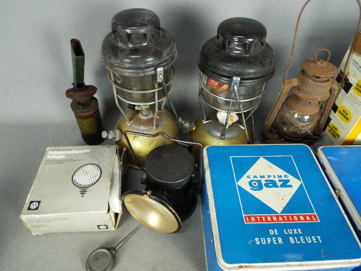 Lot to include vintage camping stoves, oil lamps and an Acme powder blower. - Image 3 of 4