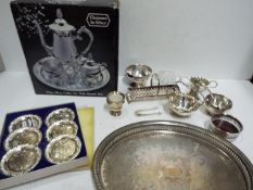 A collection of plated ware including a boxed coffee set.