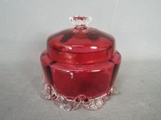 A Cranberry Glass lidded pot,