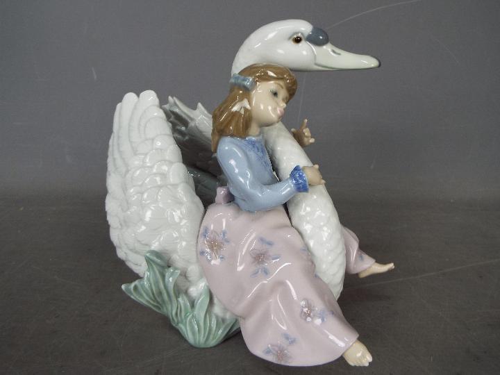 Lladro - A boxed figural group entitled Swan Song, # 5704, approximately 18 cm (h). - Image 2 of 6