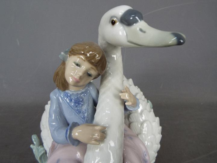 Lladro - A boxed figural group entitled Swan Song, # 5704, approximately 18 cm (h). - Image 3 of 6