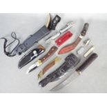 A collection of knives, multi tool and similar.