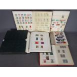 Philately - Four albums containing a quantity of UK and foreign stamps and a Marini Album
