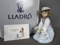 Lladro - A boxed figural group entitled Generous Gesture, # 6399,