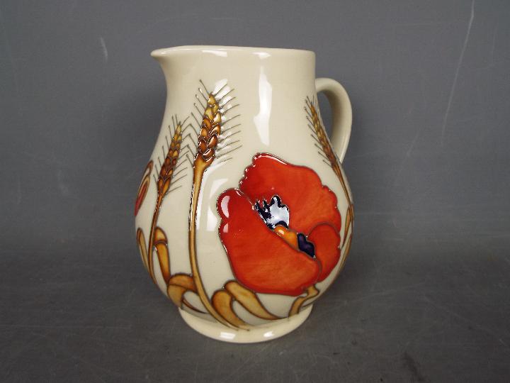 Moorcroft - a Harvest Poppy ceramic jug,