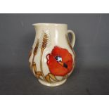 Moorcroft - a Harvest Poppy ceramic jug,