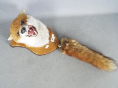 Taxidermy - A Red Fox (Vulpes vulpes) mask and tail on shield mount.