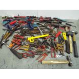 Hammers, Pliers, Snips and a large collection of similar and various tools.