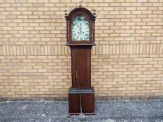 An early 19th century oak and mahogany cased 8-day longcase clock,