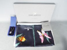 Swarovski - A boxed Swarovski necklace with crystal encrusted, heart shape pendant,
