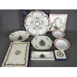 A collection of Christmas themed ceramics to include Royal Worcester Holly Ribbons,