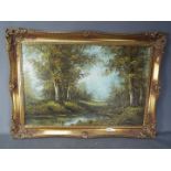 A large oil on canvas landscape scene depicting a woodland setting,