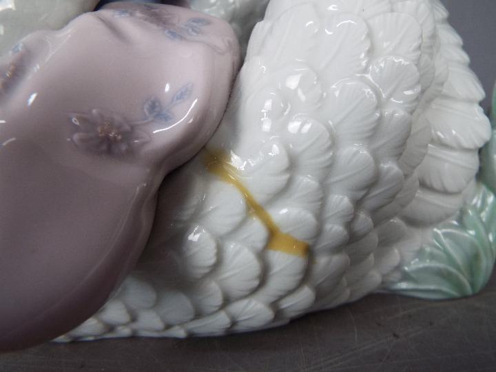 Lladro - A boxed figural group entitled Swan Song, # 5704, approximately 18 cm (h). - Image 6 of 6