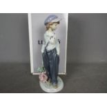 Lladro - A boxed figurine entitled The Wanderer, # 5400, approximately 21 cm (h).