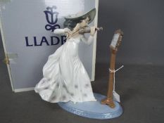 Lladro - A boxed figurine entitled Sweet Symphony, # 6243,