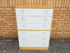A modern chest of six drawers,