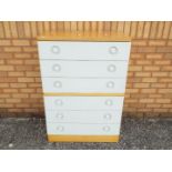 A modern chest of six drawers,