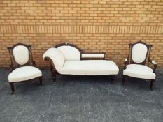 A three-piece suite comprising chaise longue and two armchairs each with matching cream upholstery