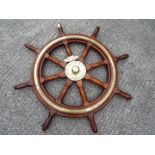 An original Scottish Ship's Wheel, teak with brass mounts scribed 'John Hastie & Co Ltd,