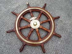 An original Scottish Ship's Wheel, teak with brass mounts scribed 'John Hastie & Co Ltd,