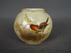 A Royal Worcester wrythen vase, shape G161, decorated with a robin, date code for 1910,