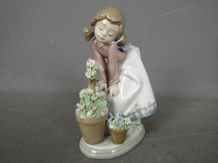 Lladro - a figurine entitled Pretty Posies in original box with internal packing pieces # 5548 - Image 2 of 3