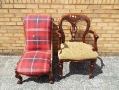 An upholstered nursing chair and one other.