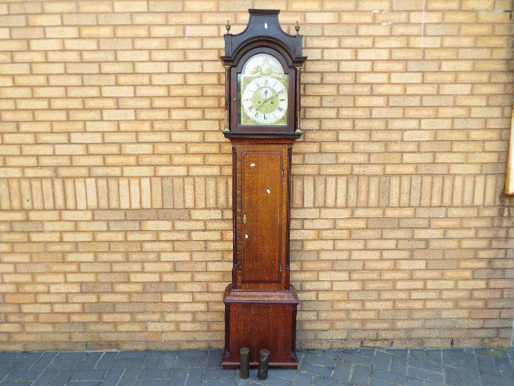 An early 18th century 8-Day Grandfather clock signed to the arched brass dial by William Bothamley