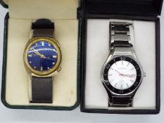 A V.C watch with box and a Interpol auto