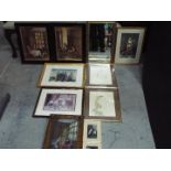 A collection of framed prints to include