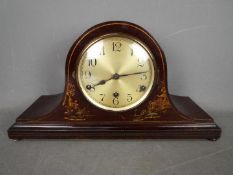 A Napoleons hat mantel clock with Chinoi