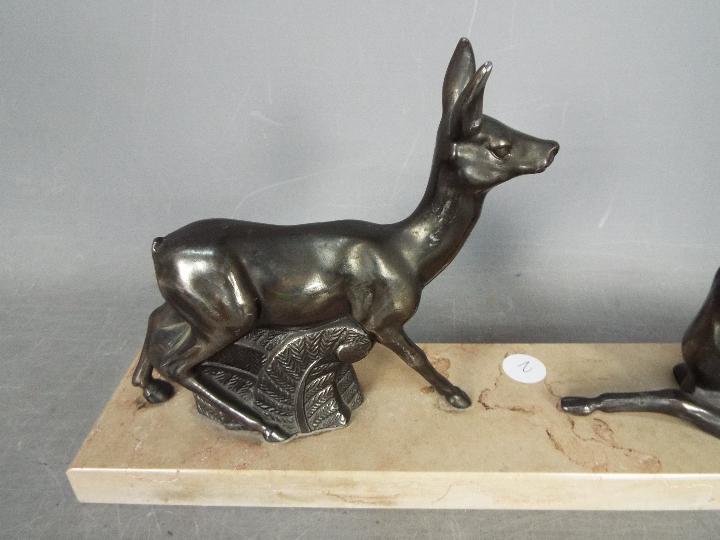 A deer set on a marble plinth, approx 16 - Image 2 of 3