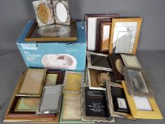 Thirty Picture frames of various sizes a