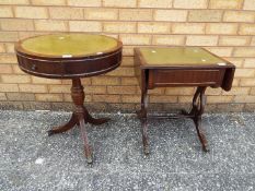 Two leather topped side tables on castored supports, largest approximately 61 cm (h) x 51 cm (d).