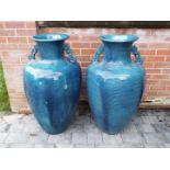 Garden décor - a pair of large blue twin handled urns,